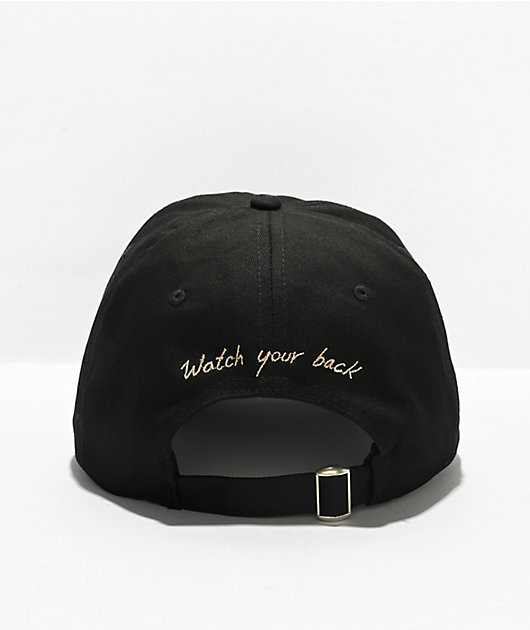 Melodie Watch Your Back gorro con banda ajustable negro