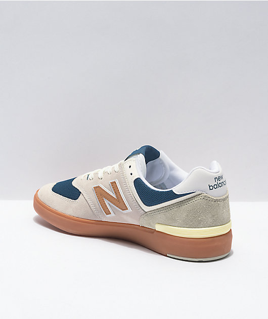 new balance numeric 574 white & gum shoes