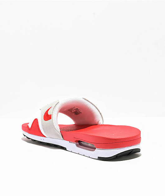 Red black and store white nike slides