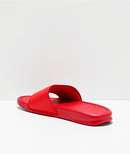 red nike slides with gold check