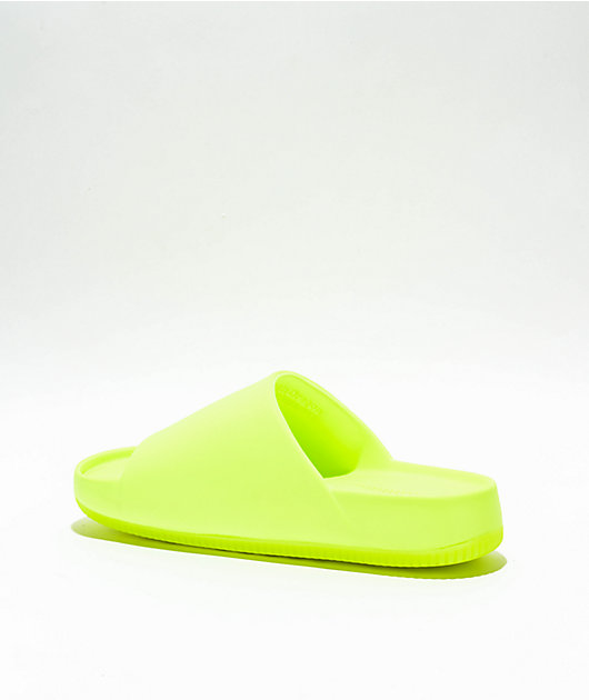 Nike slides yellow hotsell