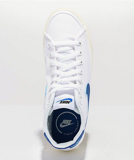 Nike white on sale and blue sneakers