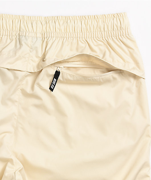 nike fossil & black track pants