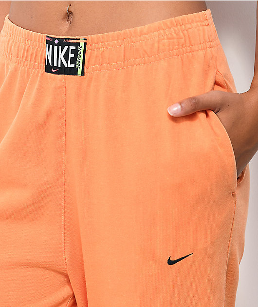 black and orange nike sweatpants