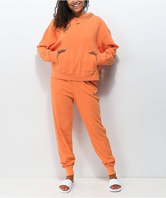 orange nike sweatpants womens