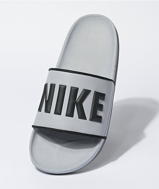 Black and grey nike slides on sale