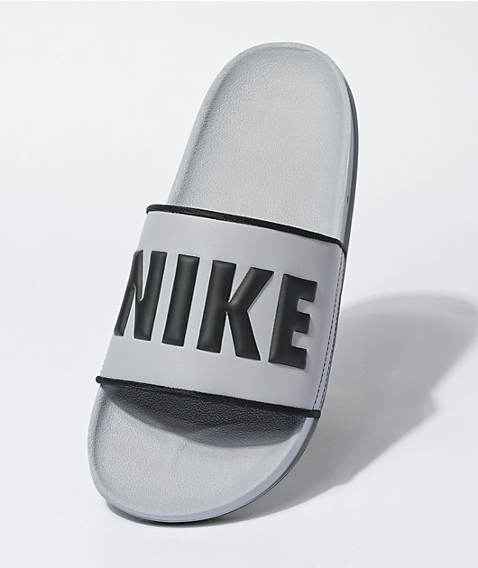 Sastre el último chorro Nike Offcourt sandalias deslizables grises y negras