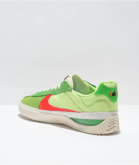 Nike green hotsell and orange shoes