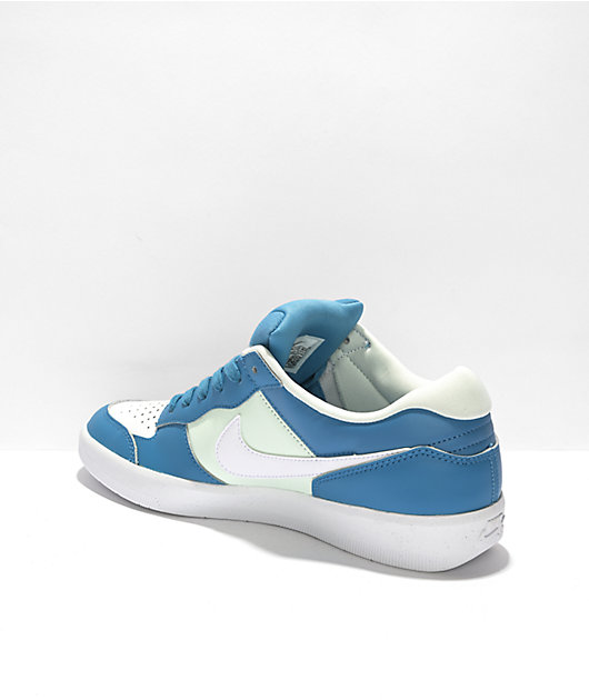 Blue and green clearance nikes