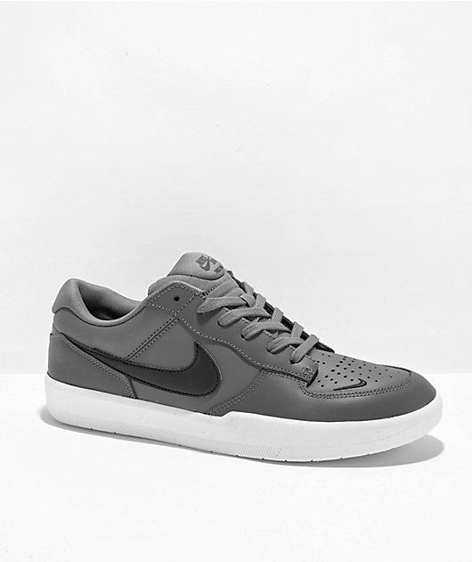 gray and black nike shoes