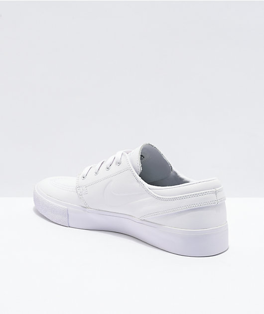 white leather nike shoes