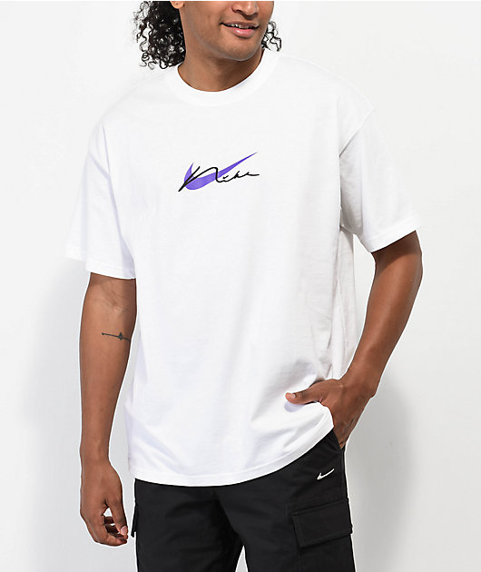 white nike shirt with purple swoosh