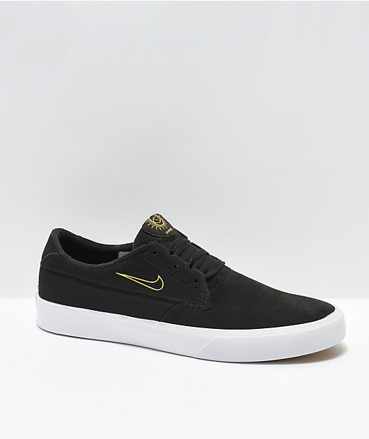 Nike skate shoes 2025 black and gold