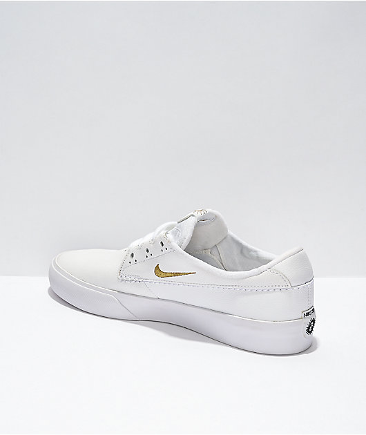 Nike gold white on sale shoes