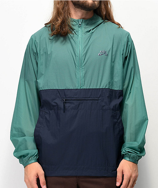 vistazo Sobretodo grano Nike SB chaqueta anorak azul marino y verde azulado