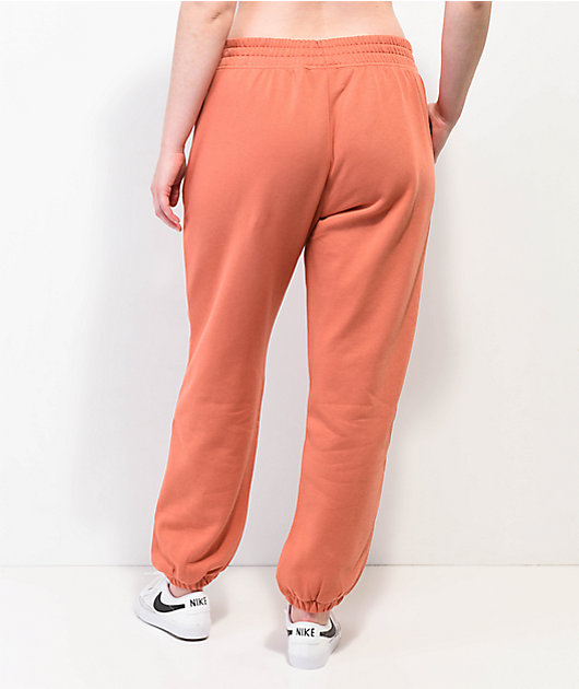 casete Exponer Solicitante Nike Sportswear Essentials pantalones de deporte naranja de lana