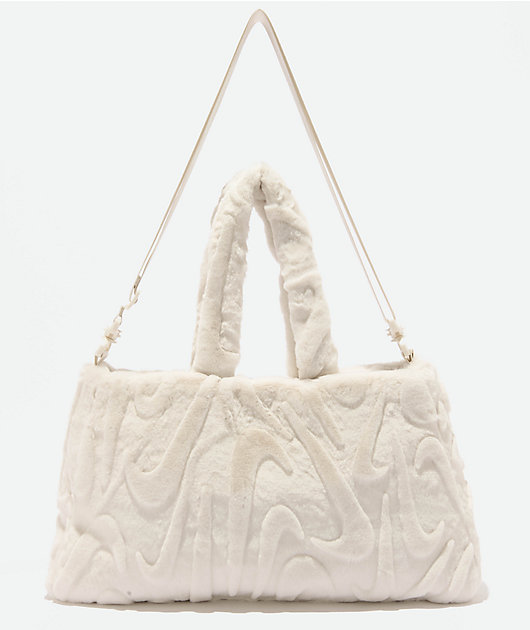 nike white furry bag