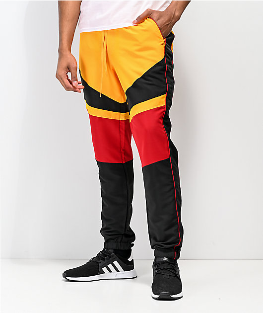 red and black track pants