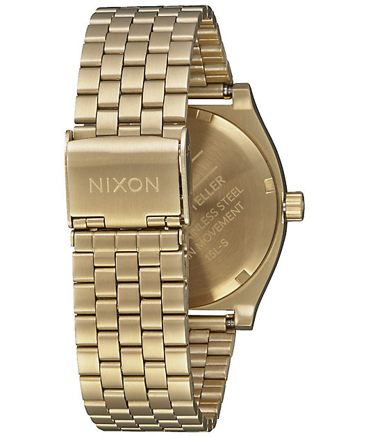 white gold nixon watch