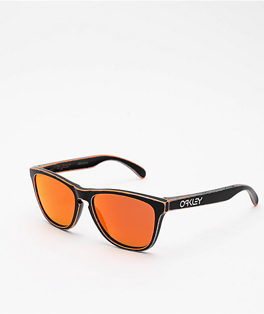 orange and black oakley sunglasses