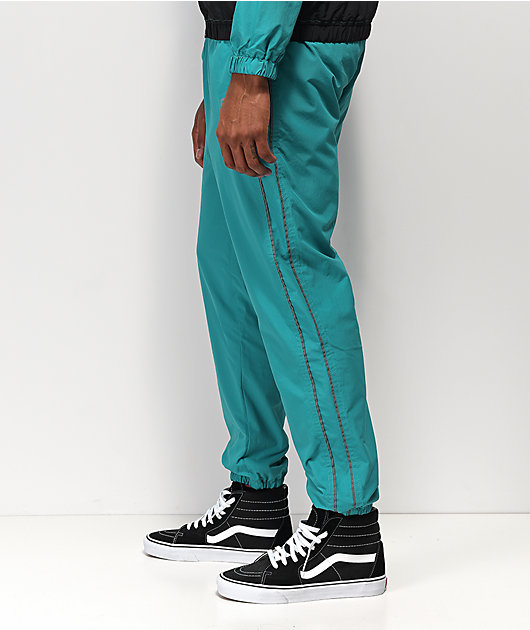 teal track pants