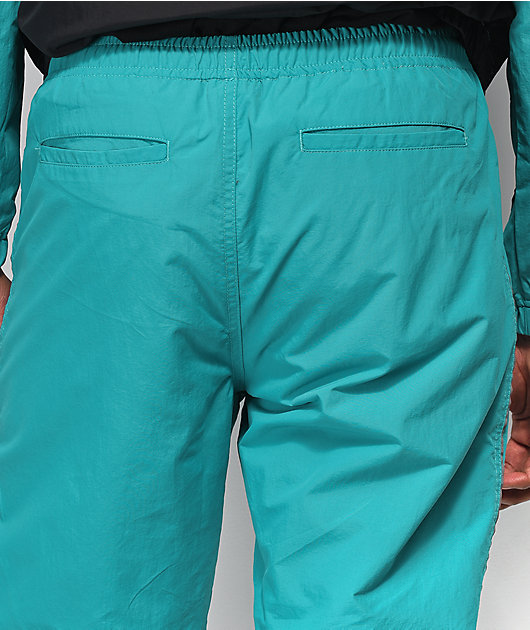 teal track pants