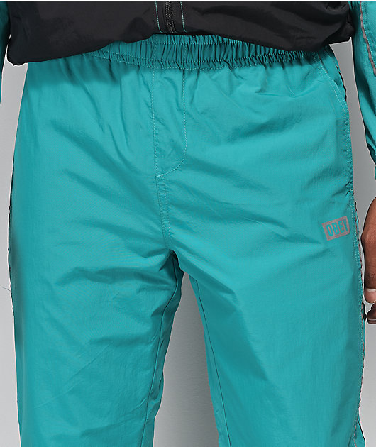 teal track pants