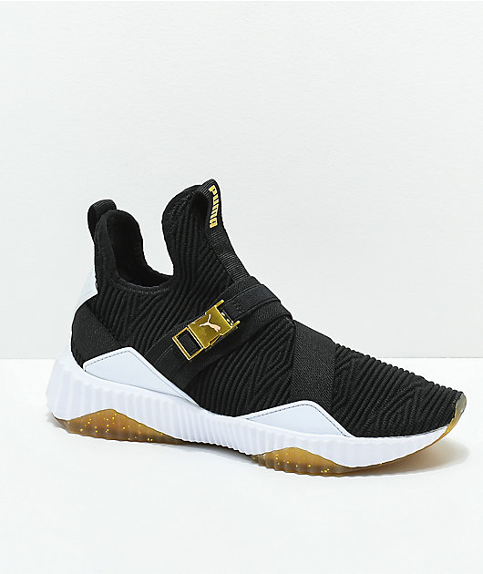 Puma defy varsity black and gold hotsell