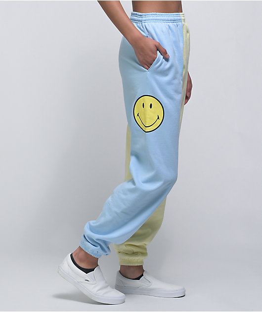 Por Samii Ryan x Smiley Smile 4 Me Pantalones de chándal divididos en azul y amarillo