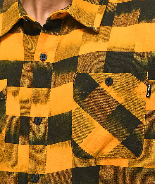 white and orange flannel