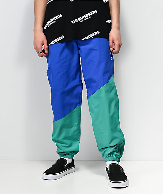blue nylon track pants