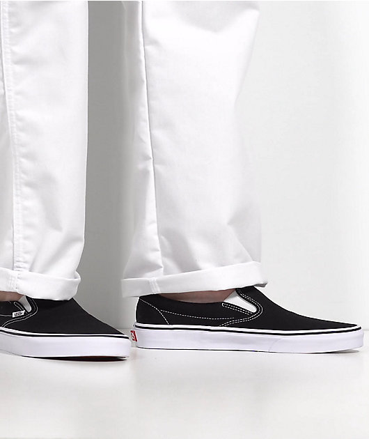 Black n white hot sale slip on vans