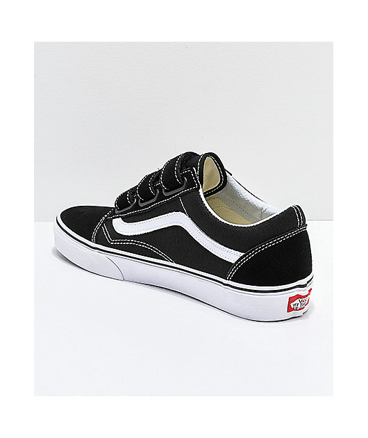 black and white vans with straps