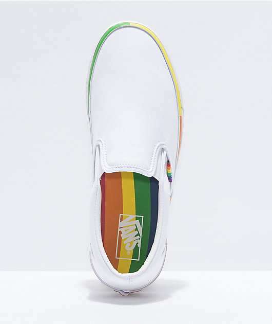 White slip on sale vans with rainbow