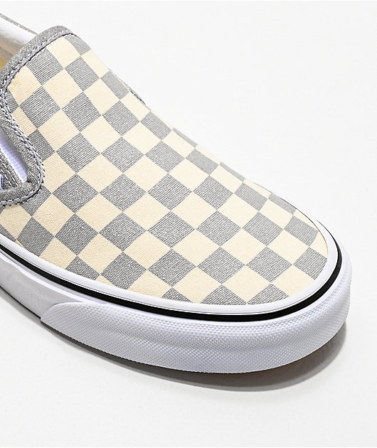 silver and black checkered vans