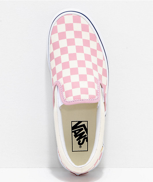 pink and white vans slip ons