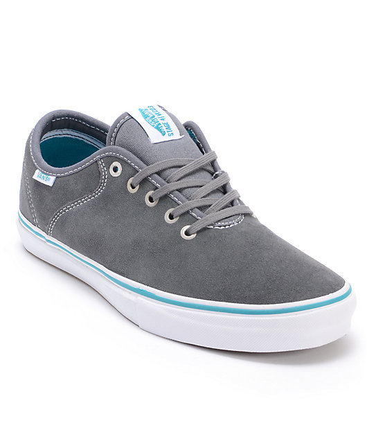 teal and gray vans