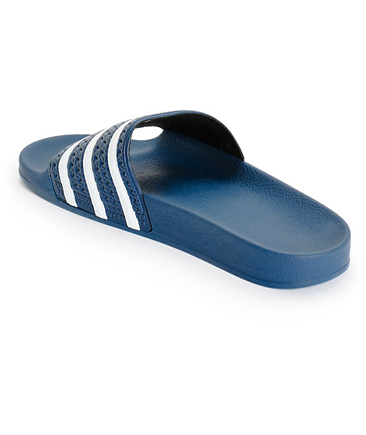 blue and white adidas slides