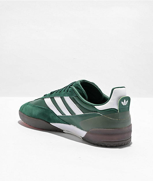 White adidas shoes with cheap green back