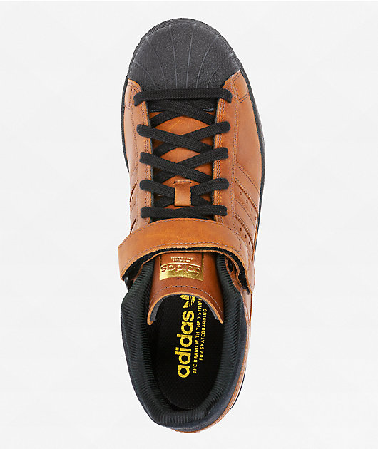 Adidas superstar black and brown shop
