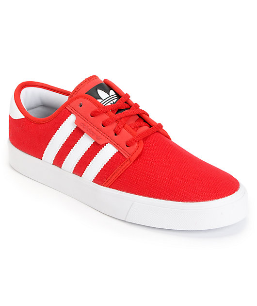 red and white canvas shoes