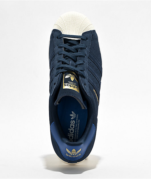 Adidas superstar with blue stripes best sale