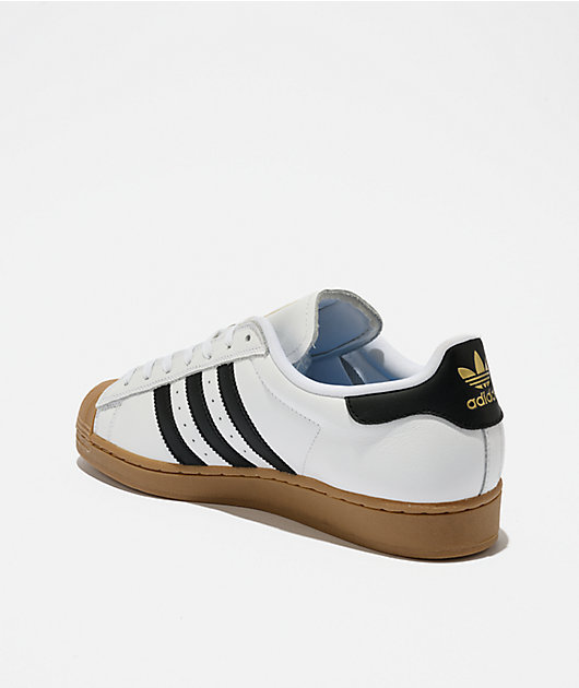 white adidas with colorful back