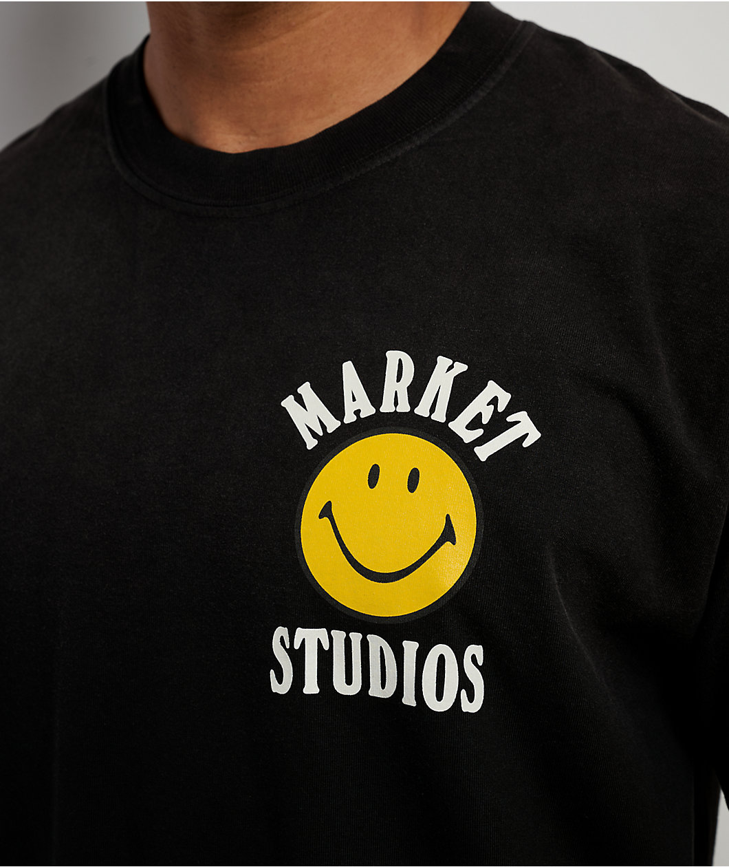 Market Studios Smiley Lockup Jet Set Black T-Shirt