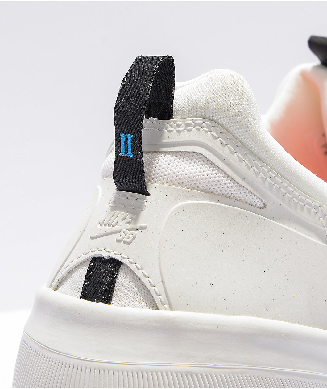 Nike SB Nyjah Free 2.0 White, Blue, & Red Skate Shoes