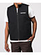 Independent Chaleco reversible negro y naranja
