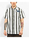 Monet Puppet camisa de manga corta blanca, negra y verde con botones