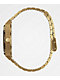Nixon Timeteller reloj analógico en negro y color oro