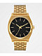Nixon Timeteller reloj analógico en negro y color oro