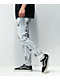 Skinny jeans envejecidos claros estampados Rogue de Ninth Hall